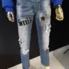Spodnie jeansowe z ozdobną aplikacją